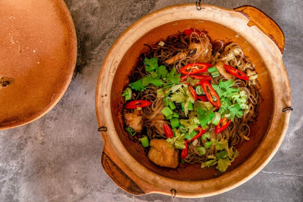 vegan clay pot mung bean noodles with tofu puffs