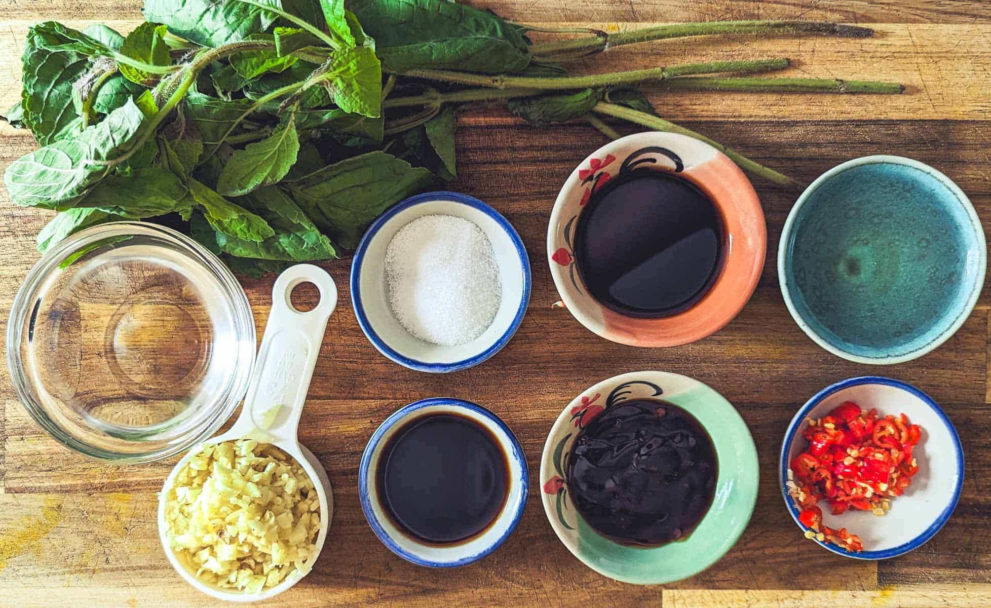 Shot from above of ingredients for holy basil sauce